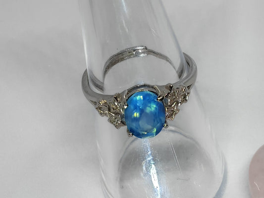 Blue Star Gazing - Sterling Silver Adjustable Ring with CZ Stars Surrounding a Beautiful Aqua Stone. Up to Size (Q)