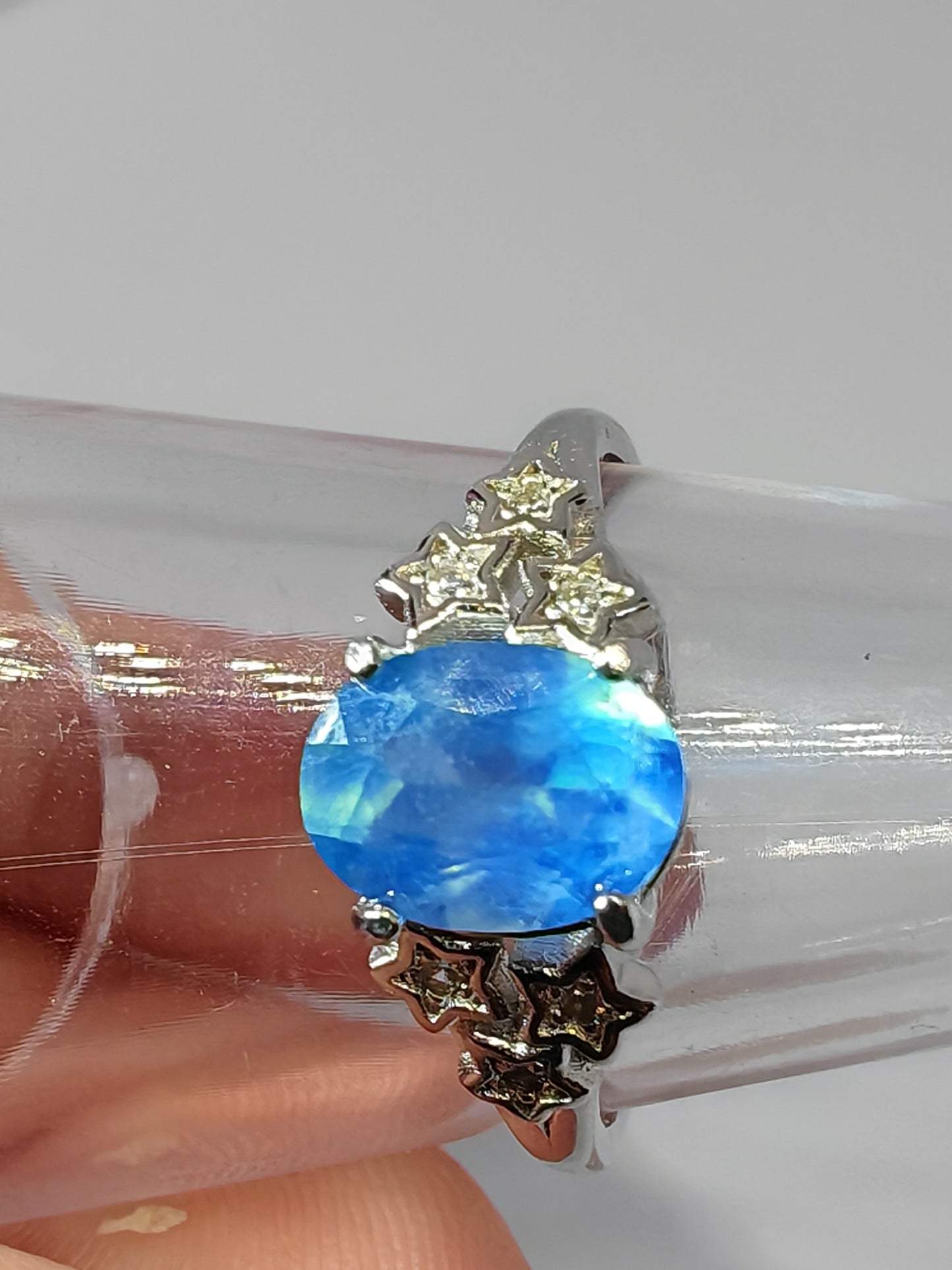 Blue Star Gazing - Sterling Silver Adjustable Ring with CZ Stars Surrounding a Beautiful Aqua Stone. Up to Size (Q)